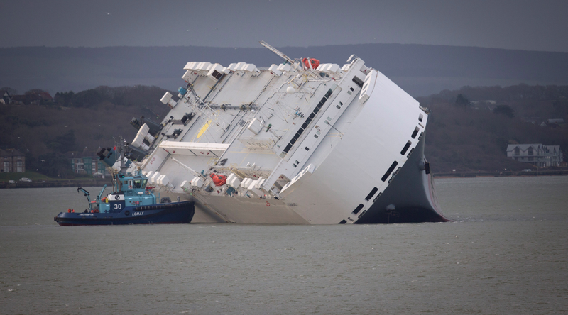 Illustration for article titled These Photos Of That Grounded Car Carrier Ship Are Beautifully Surreal